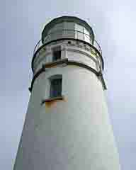 View of the top of Port Orford's Cape Blanco Lighthouse in Oregon Fiddlersgreen.net